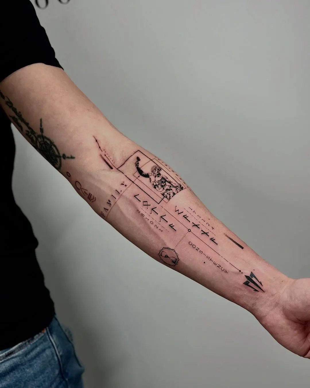 Artistic minimalist tattoo design on forearm