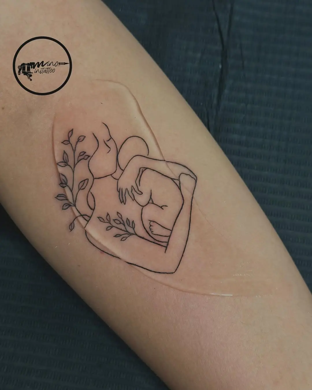 Stylish mother-child connection tattoo design