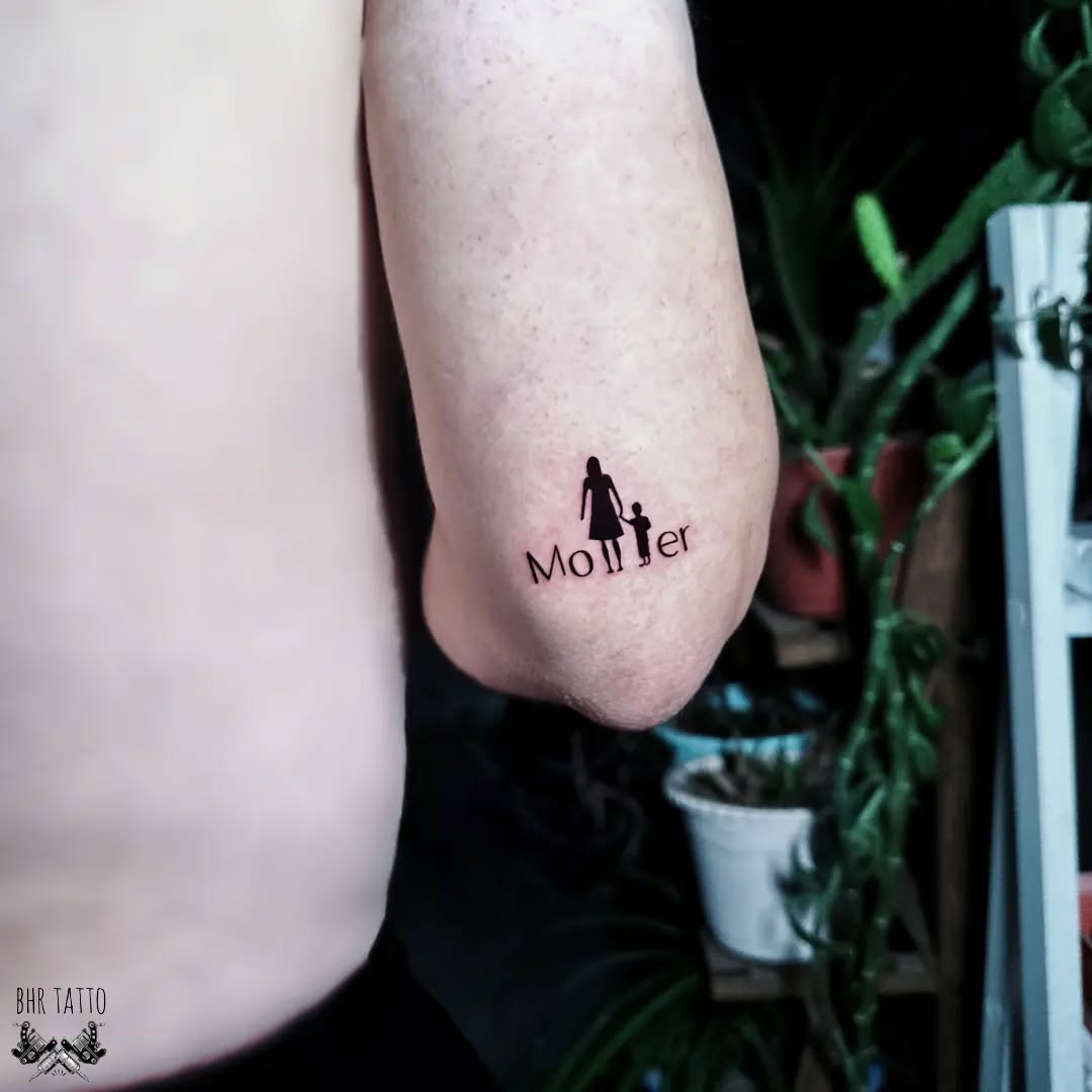 Meaningful mother-child silhouette tattoo design