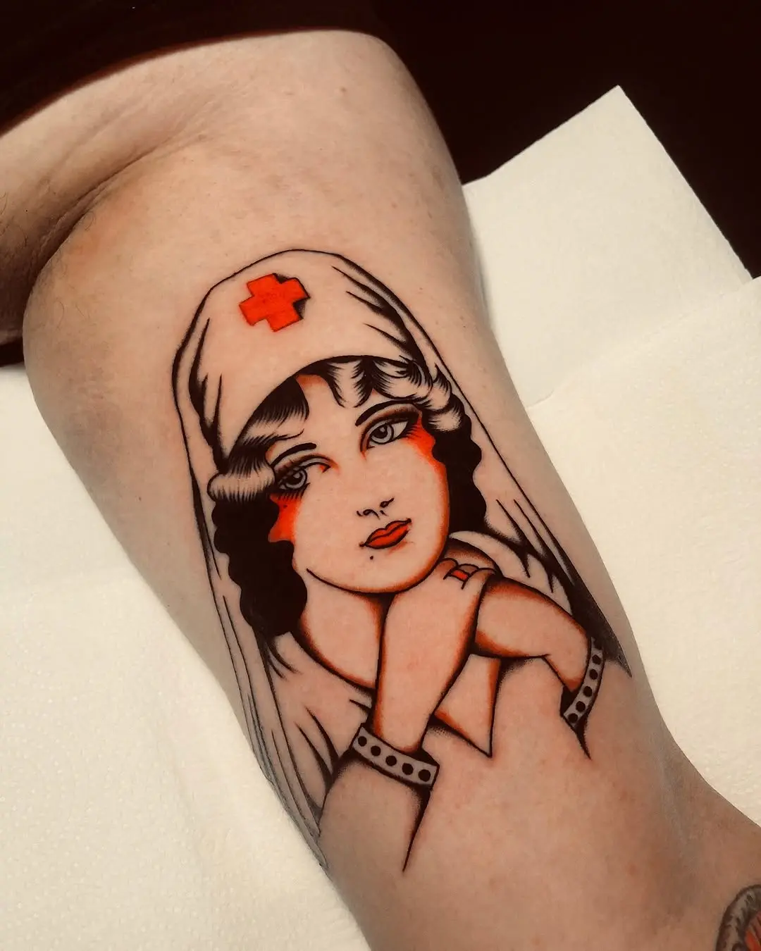 Vintage nurse tattoo with classic charm