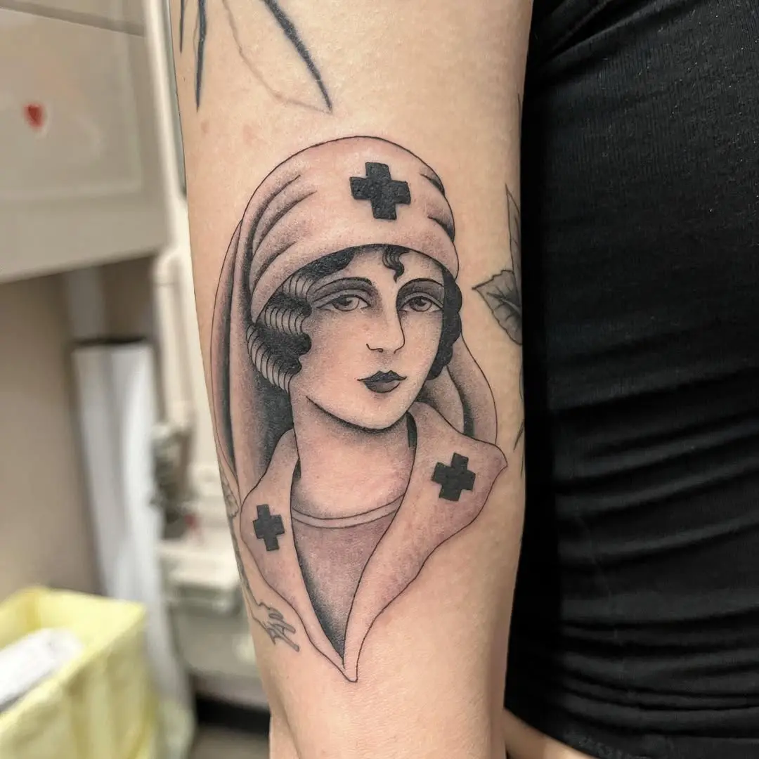 Classic nurse tattoo with vintage flair