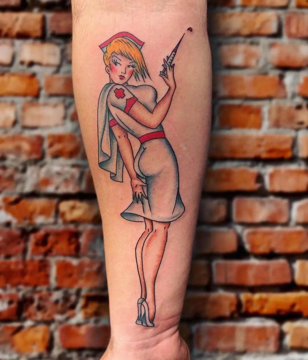 Vintage nurse tattoo with playful charm