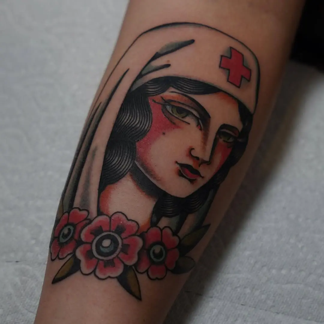 Classic nurse tattoo with a floral twist