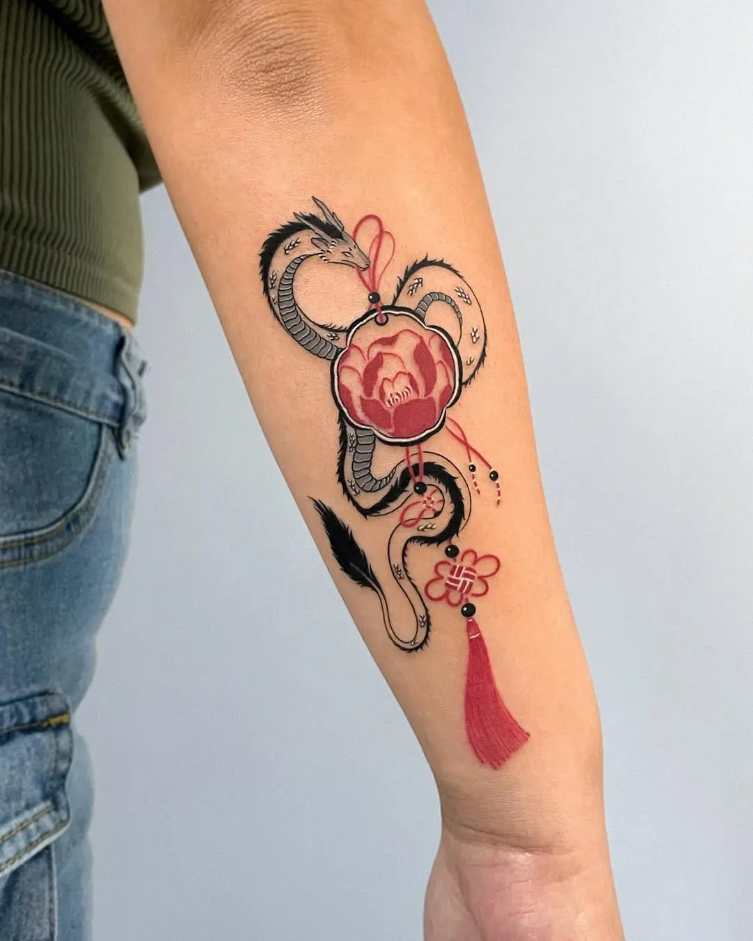 Intricate snake and flower fusion tattoo