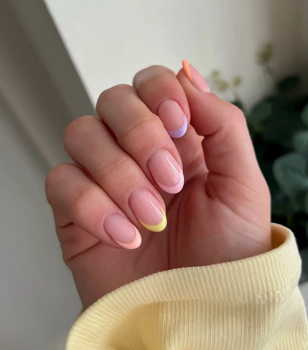Chic peach nails with vibrant color tips