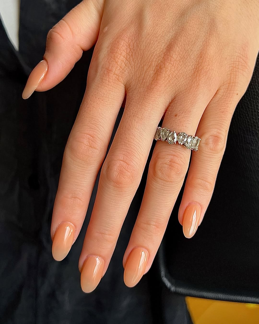 Elegant peach nails with subtle shine