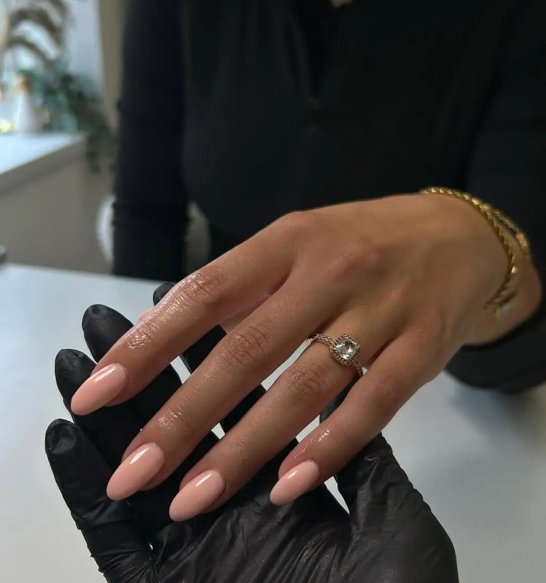 Elegant peach nails with a glossy finish