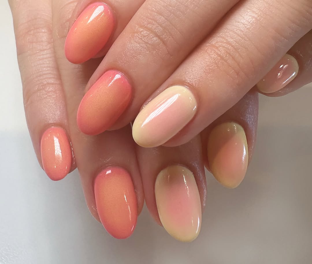 Stylish peach gradient nails for a fresh look