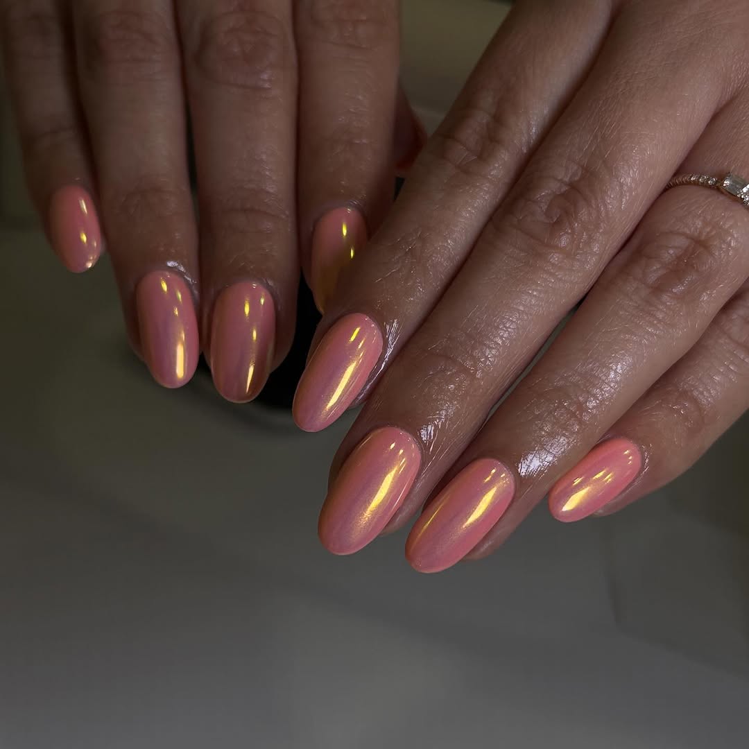 Stylish peach nails with a glossy finish