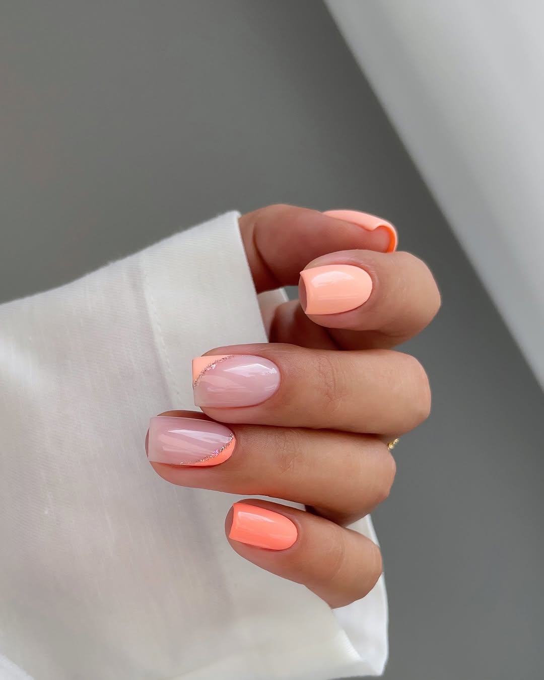 Stylish summer peach nails with unique design
