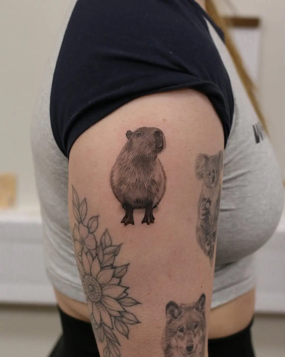 Charming capybara tattoo on display