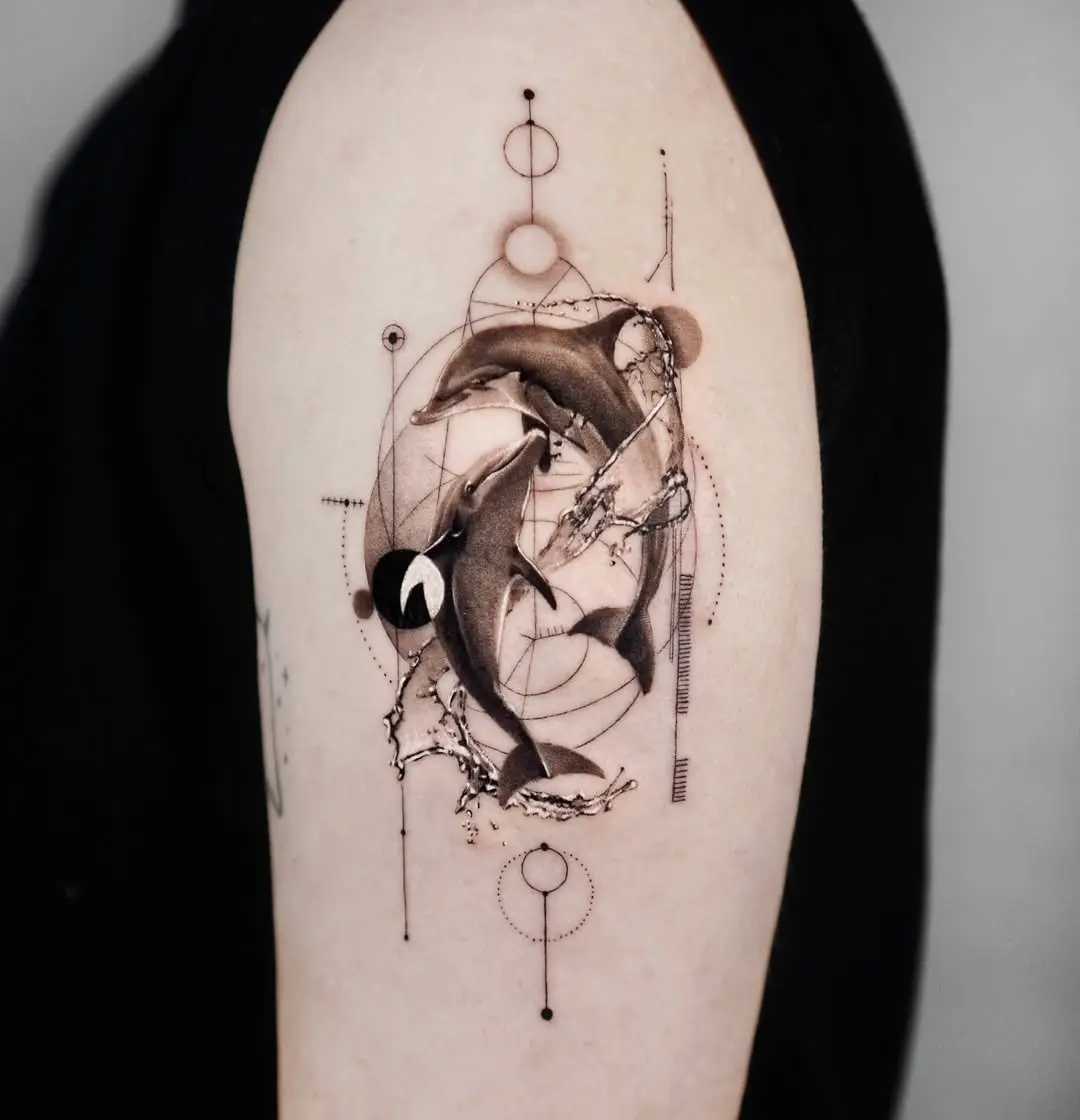 Stunning Dolphin Tattoo with Artistic Elements