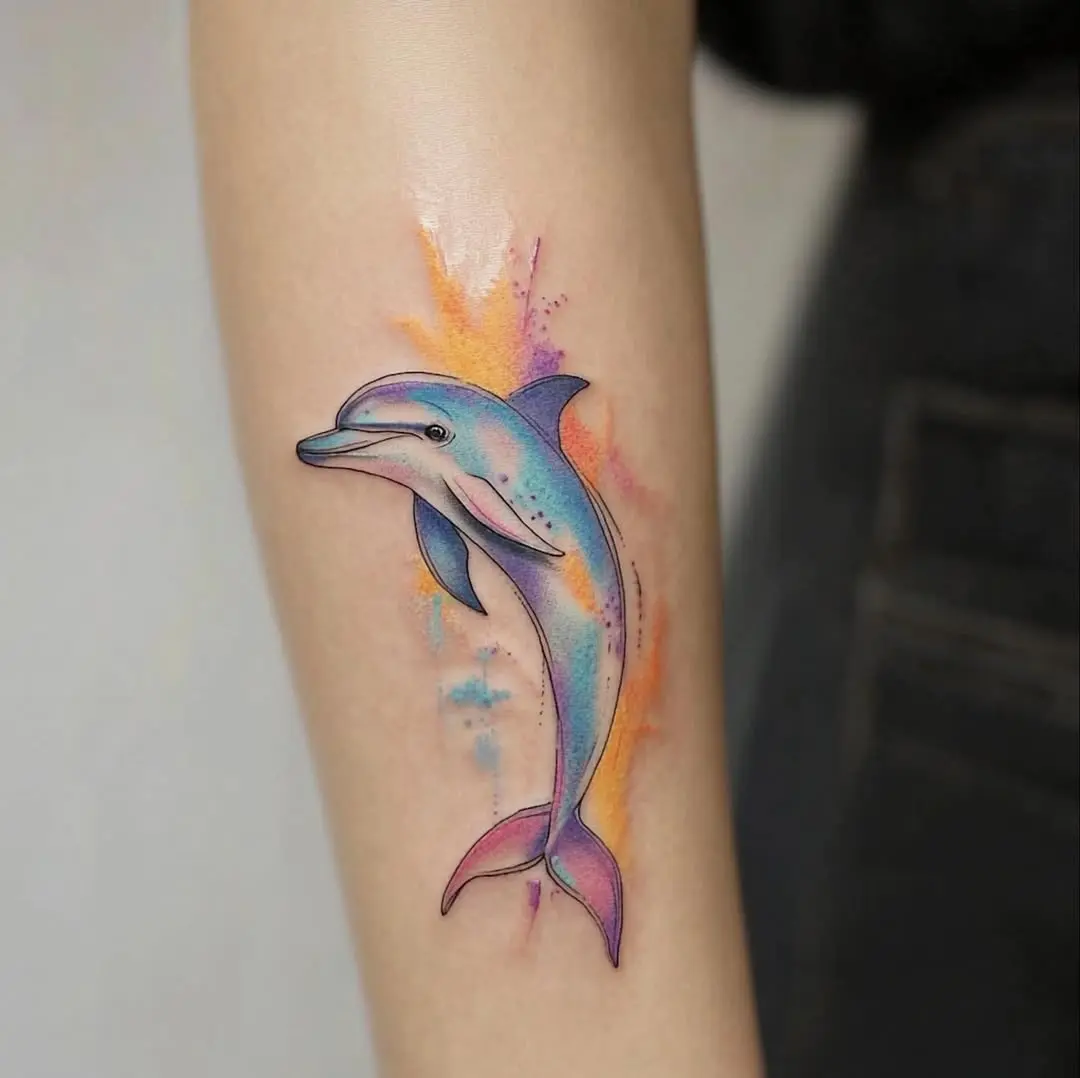 Colorful dolphin tattoo showcasing playful elegance