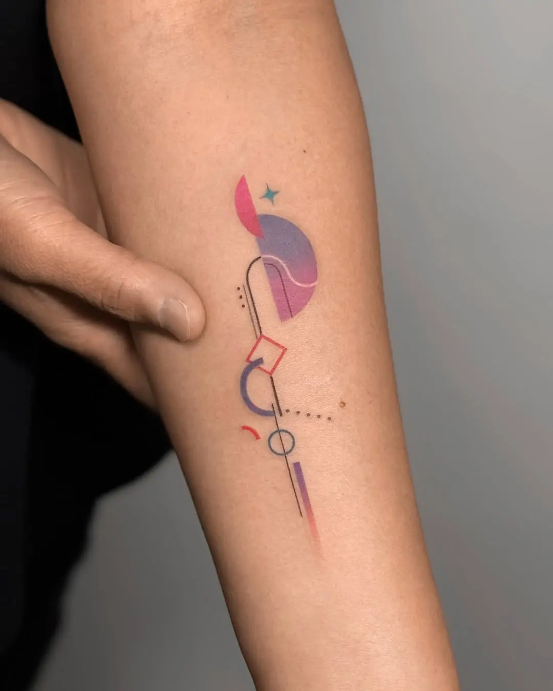 Vivid Abstract Tattoo with Geometric Elements