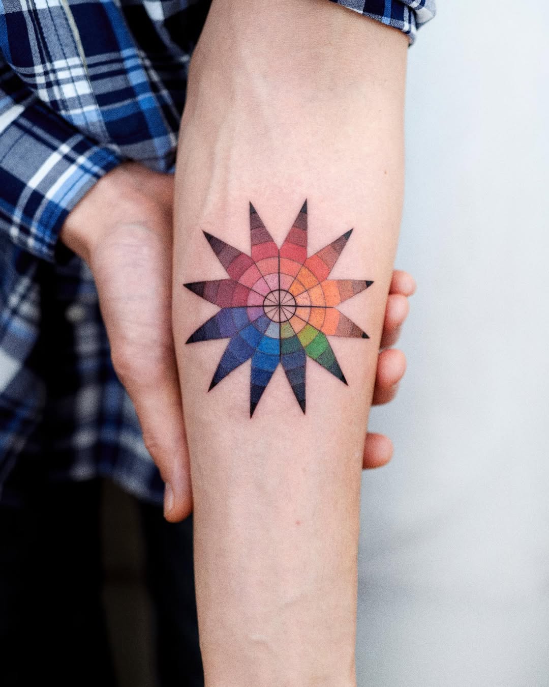Vibrant star tattoo showcasing color harmony