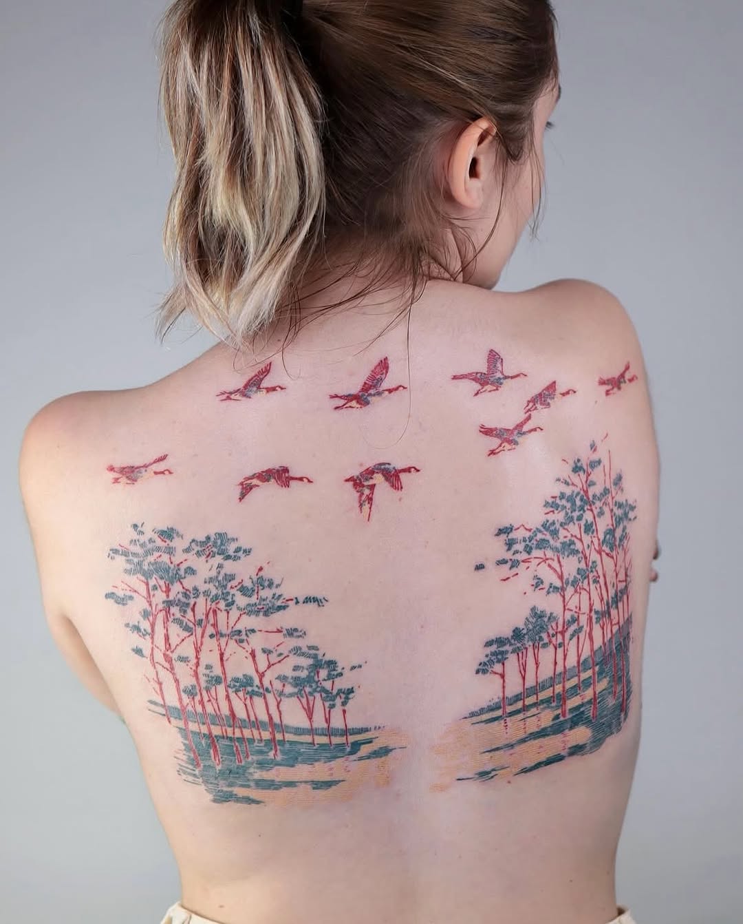 Serene forest and bird tattoo design