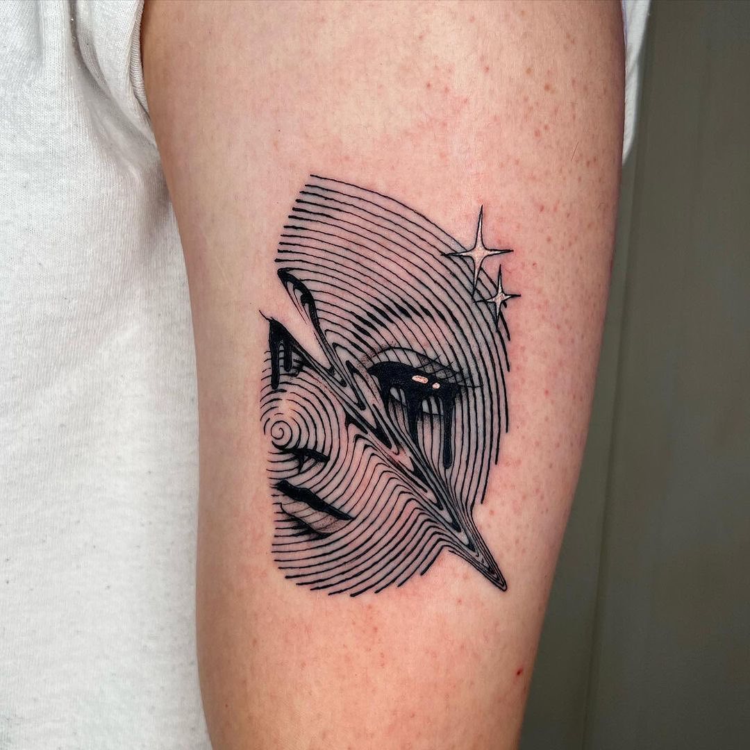 Abstract face with cosmic elements tattoo design