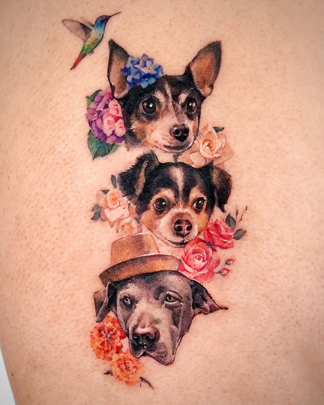 Whimsical pet tattoo surrounded by flowers