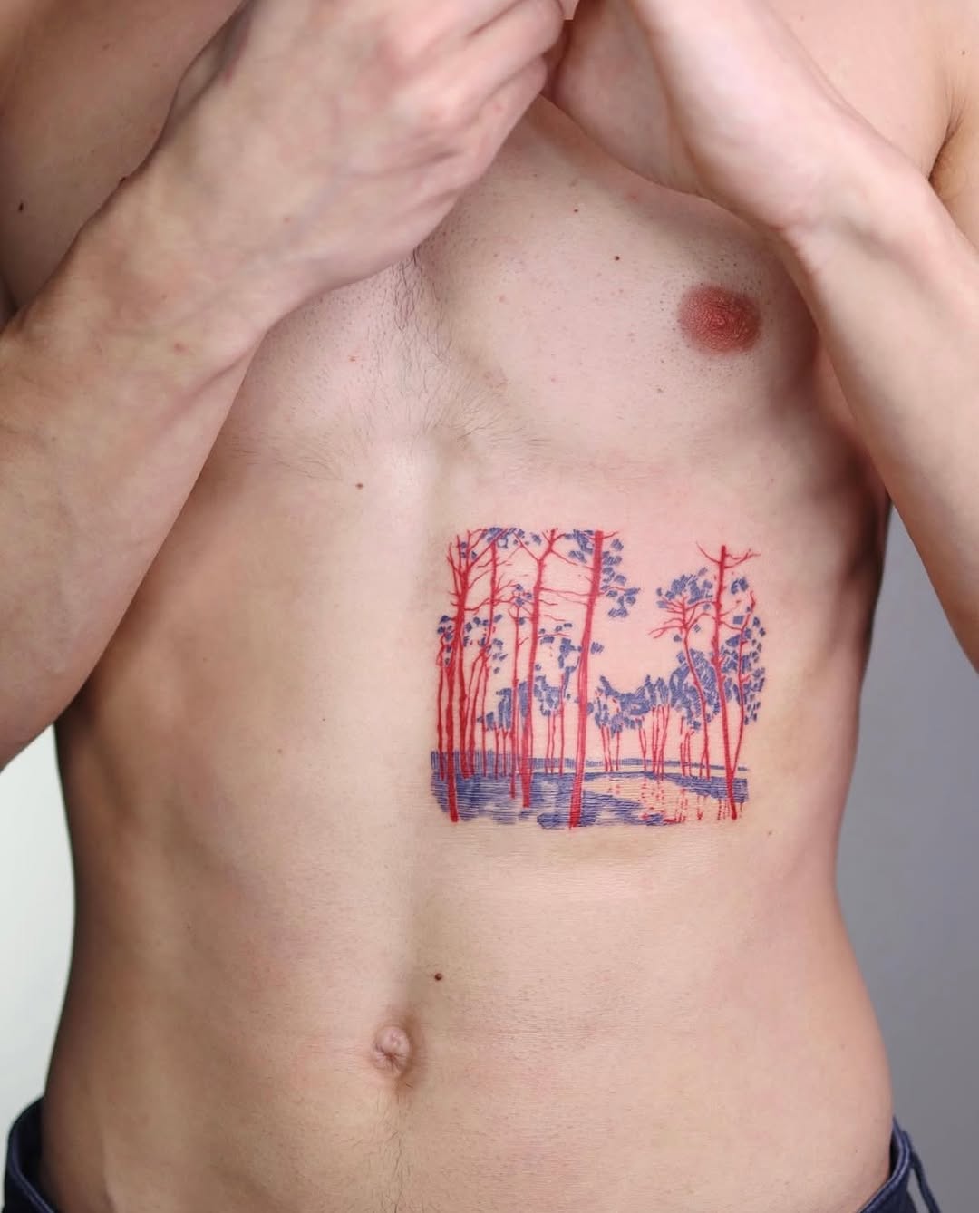 Vibrant nature tattoo on the chest