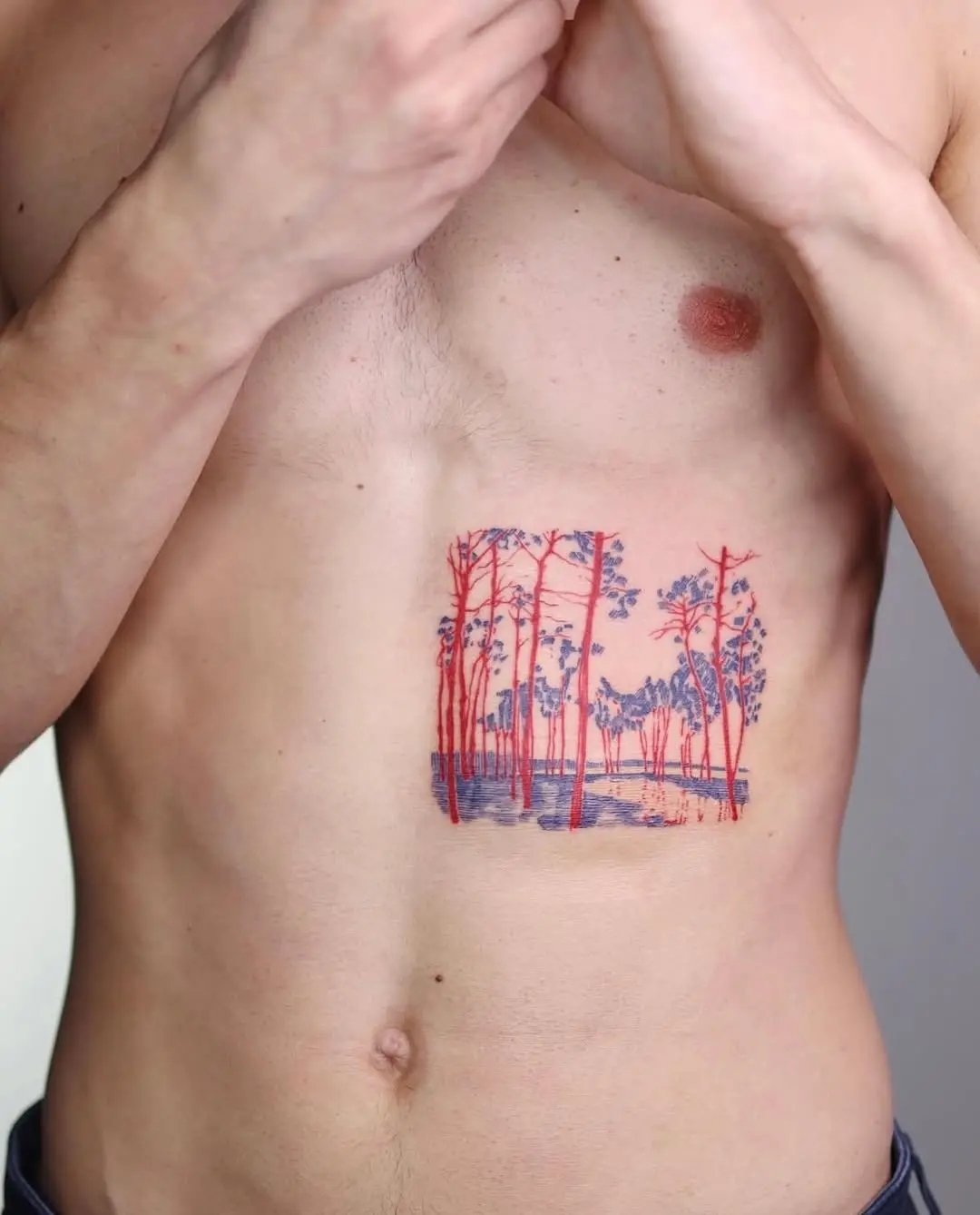 Vibrant nature tattoo on the chest
