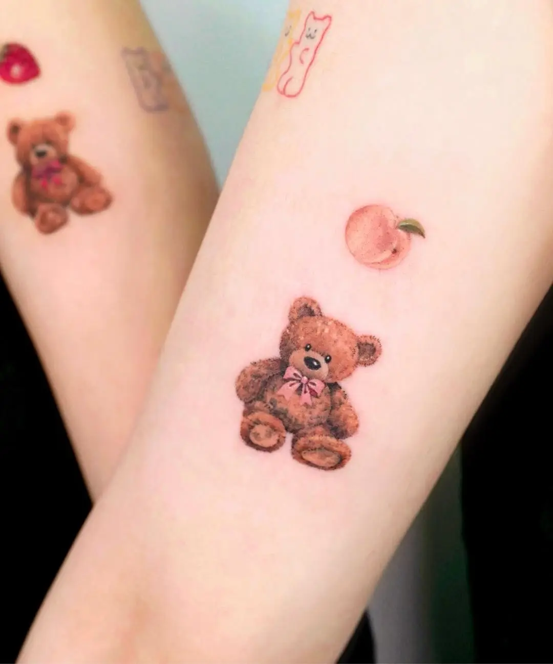 Adorable bear and peach friendship tattoos