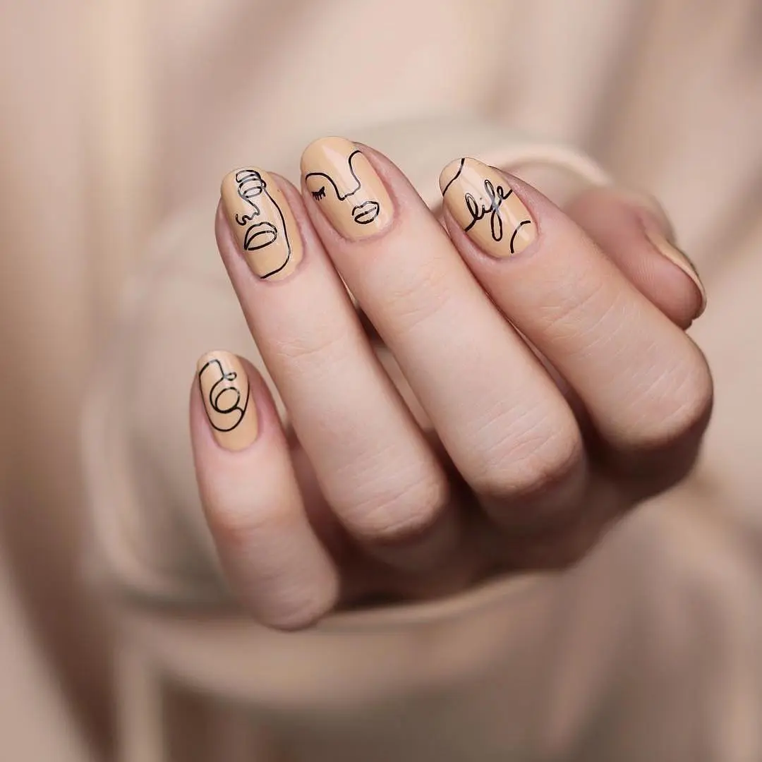 Trendy beige nails with artistic line designs