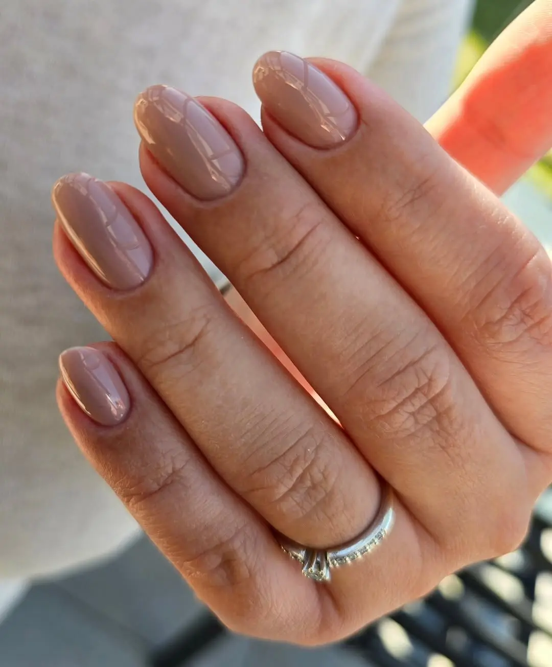 Chic glossy beige manicure with elegant vibes