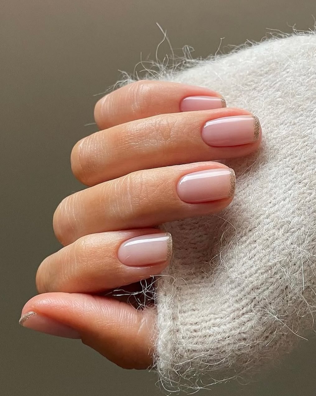 Elegant beige nails with a touch of shine