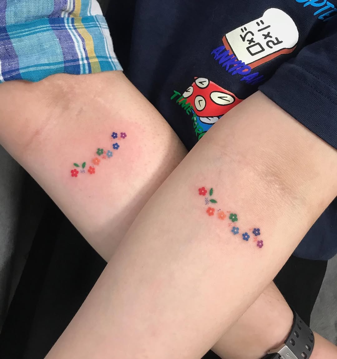 Delicate floral tattoos for best friends
