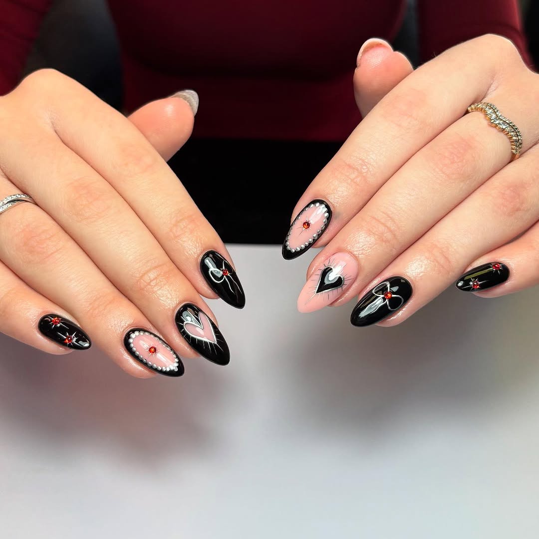 Edgy black nails with vibrant nail art details