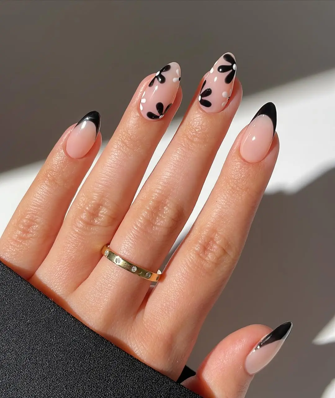 Elegantly Stylish Black Tips with Floral Accents