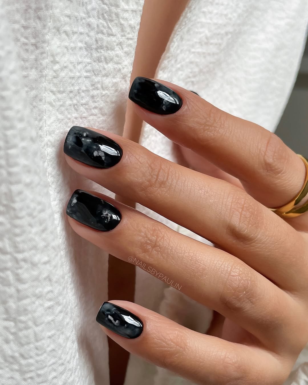 Chic black nails with glossy finish