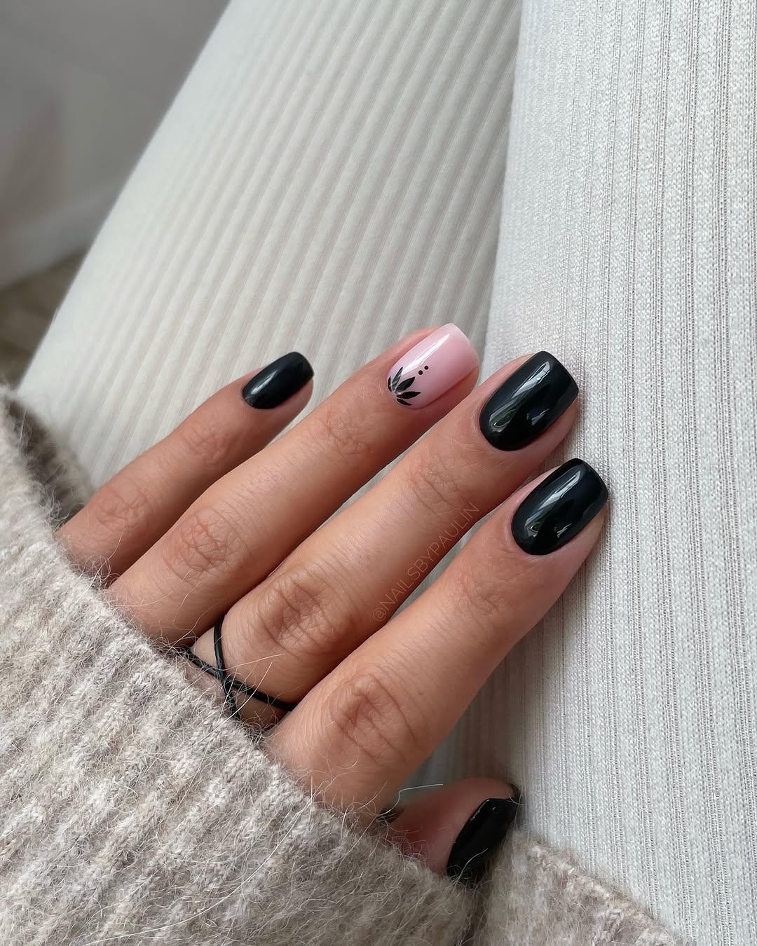 Chic black nails with a pop of pink