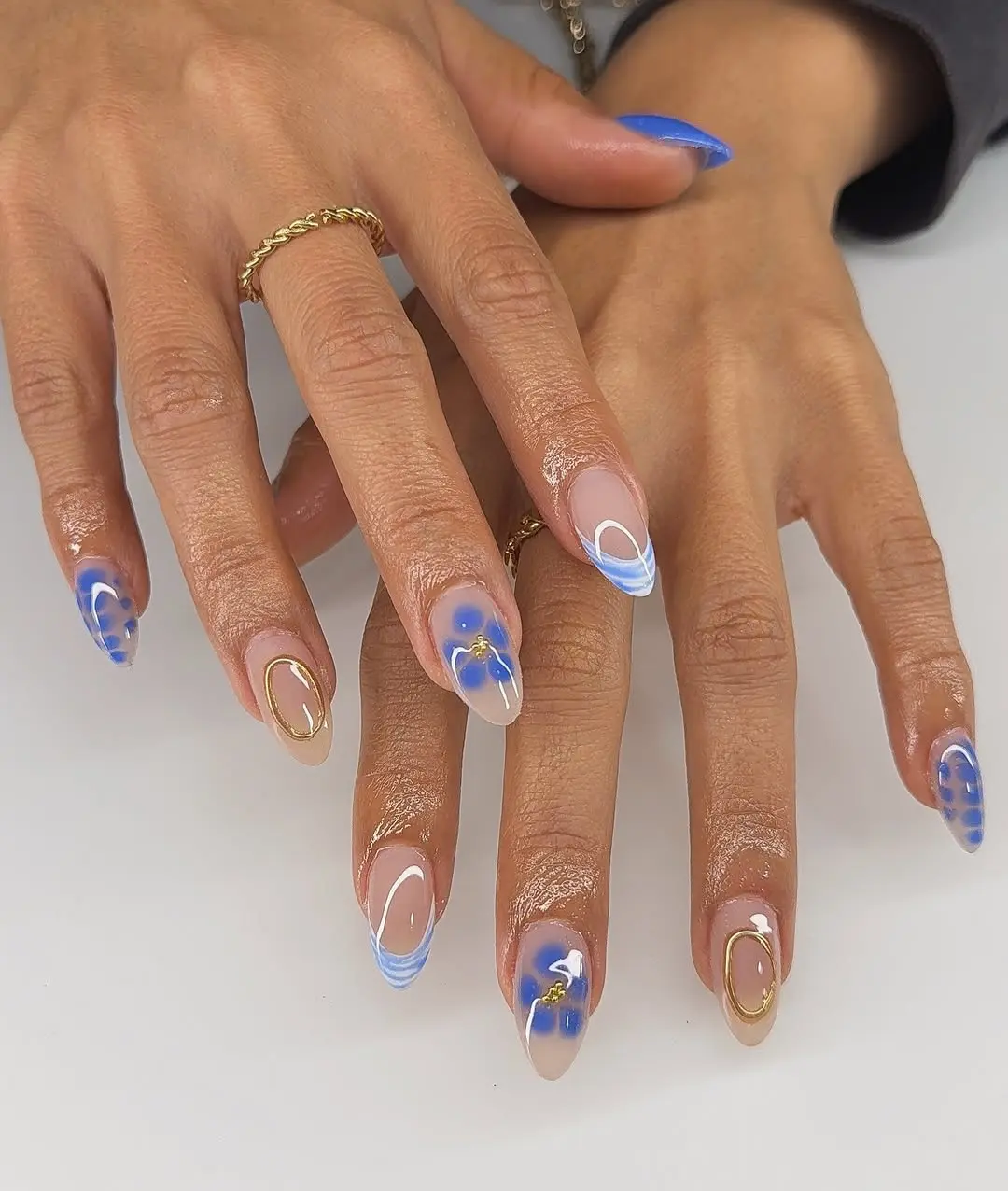 Elegant Blue Nails with Floral Accents
