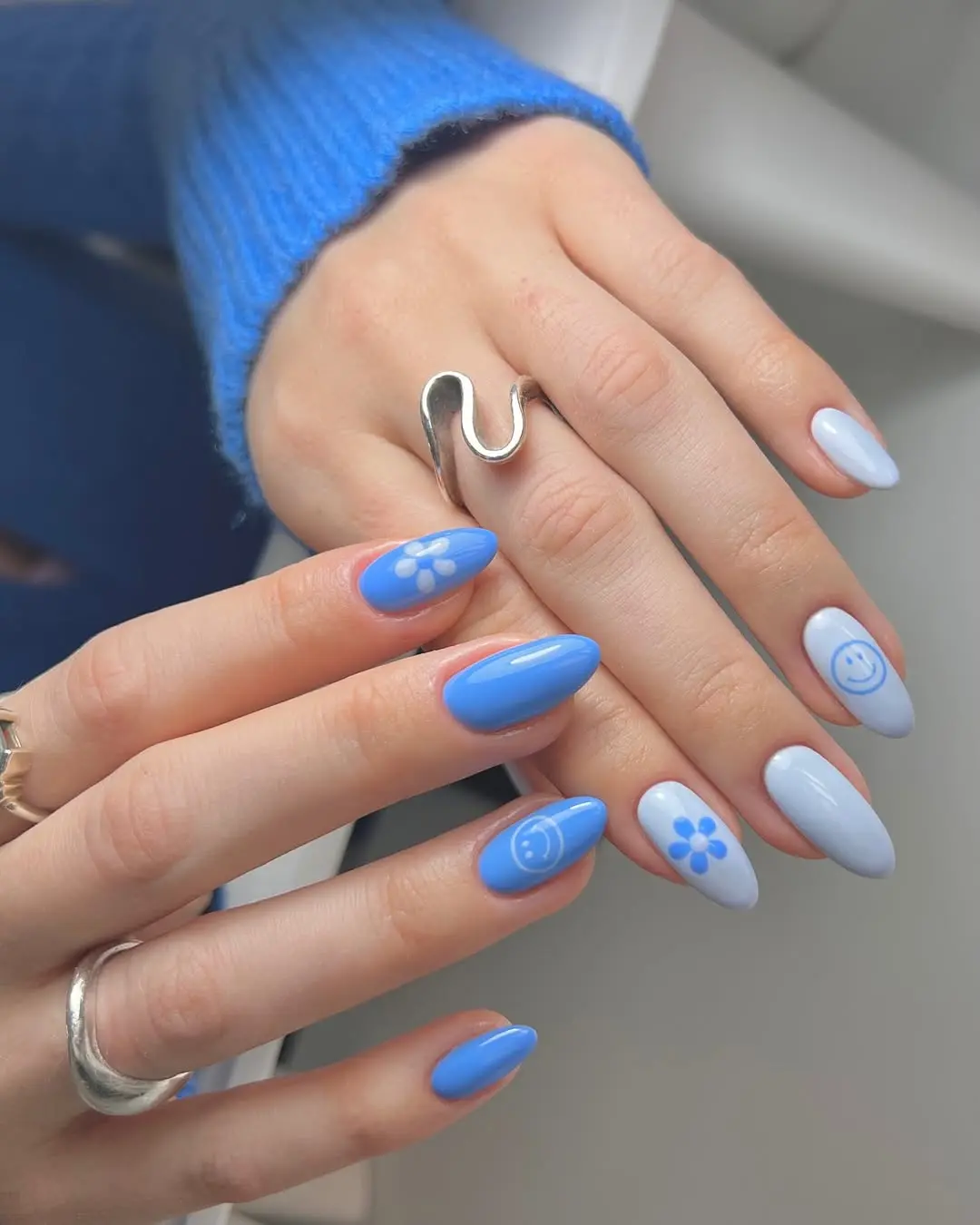 Chic blue nails with playful designs