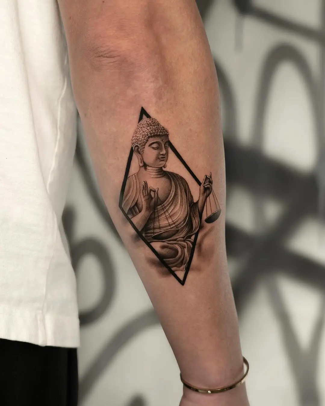 Intricate Buddha tattoo with spiritual vibes