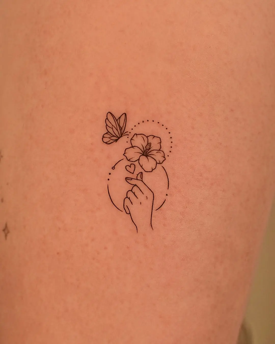Delicate design featuring a hand and nature