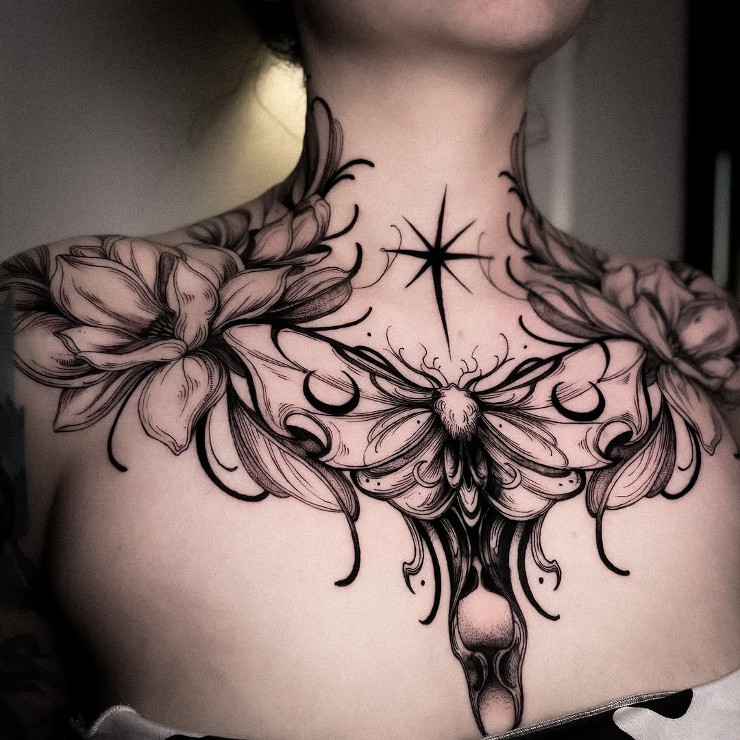 Elegant floral and butterfly chest tattoo artwork