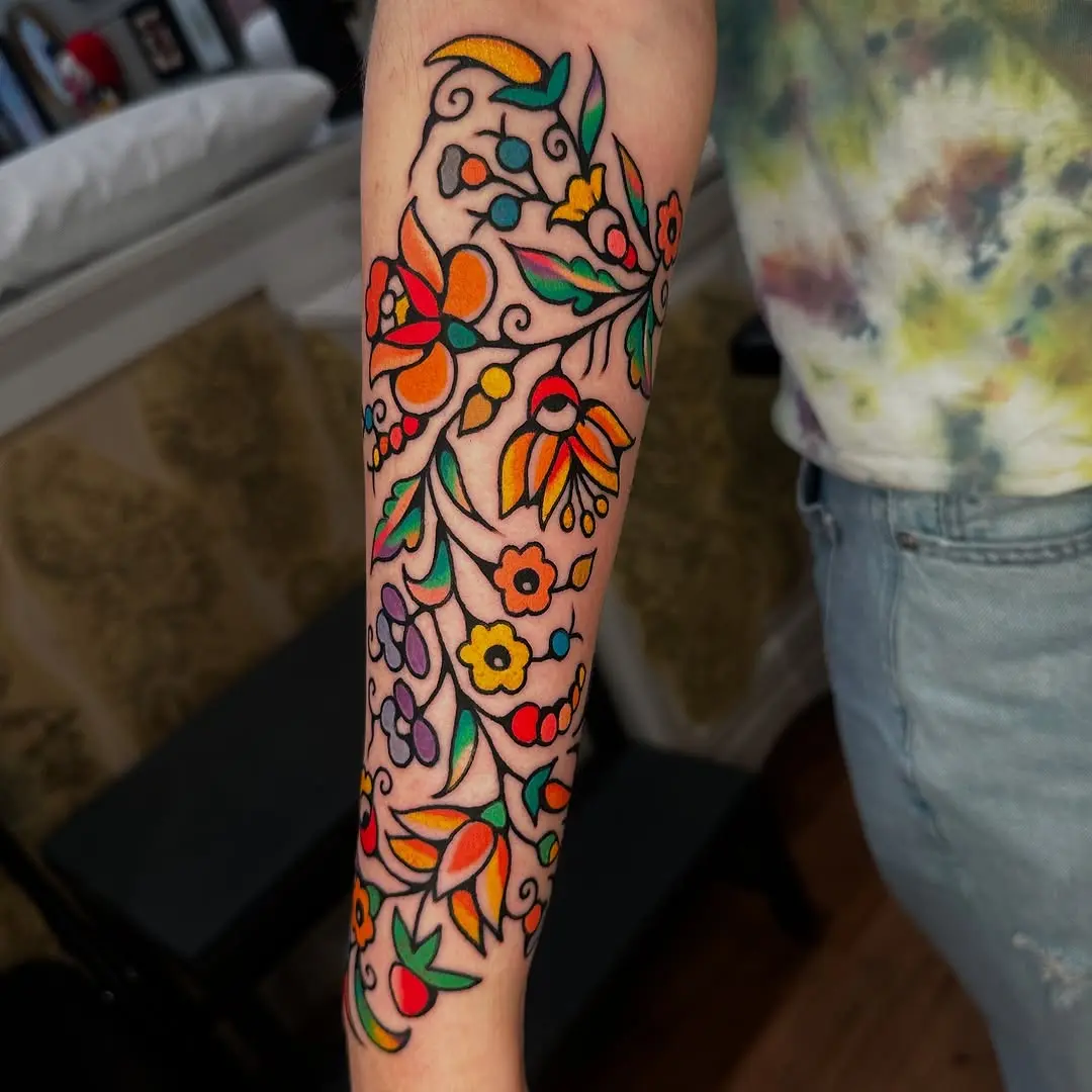 A vibrant blossom tattoo showcasing vivid colors