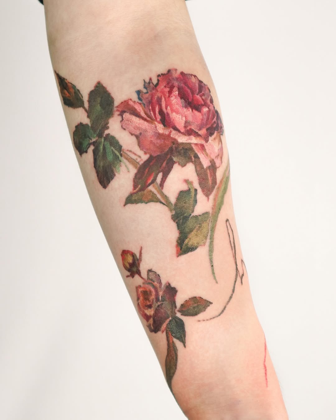 Stunning peony flower tattoo with bold colors