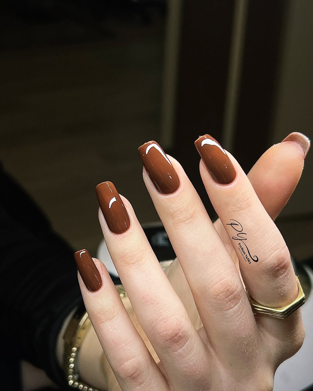 Elegant brown nails with chic glossy tips
