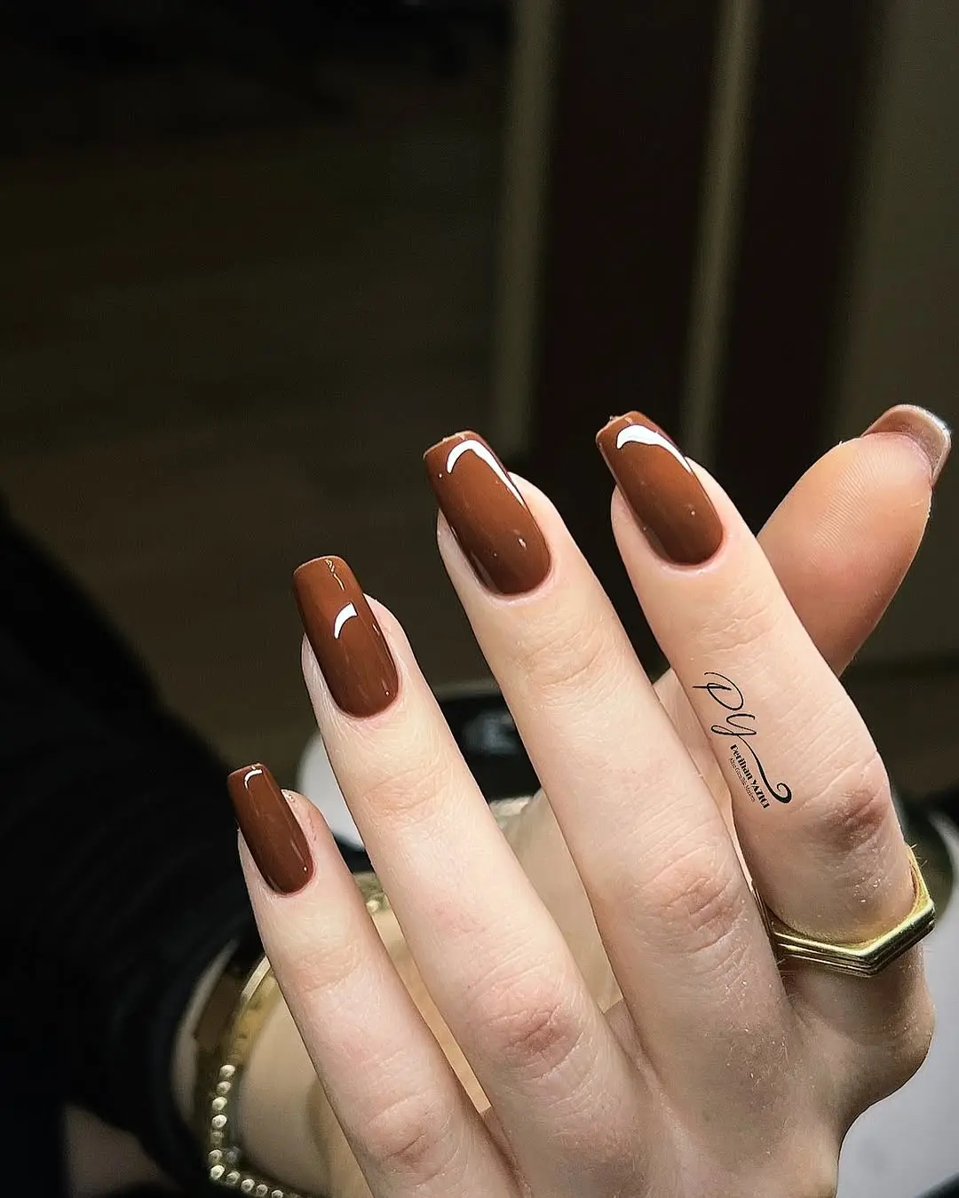 Elegant brown nails with chic glossy tips