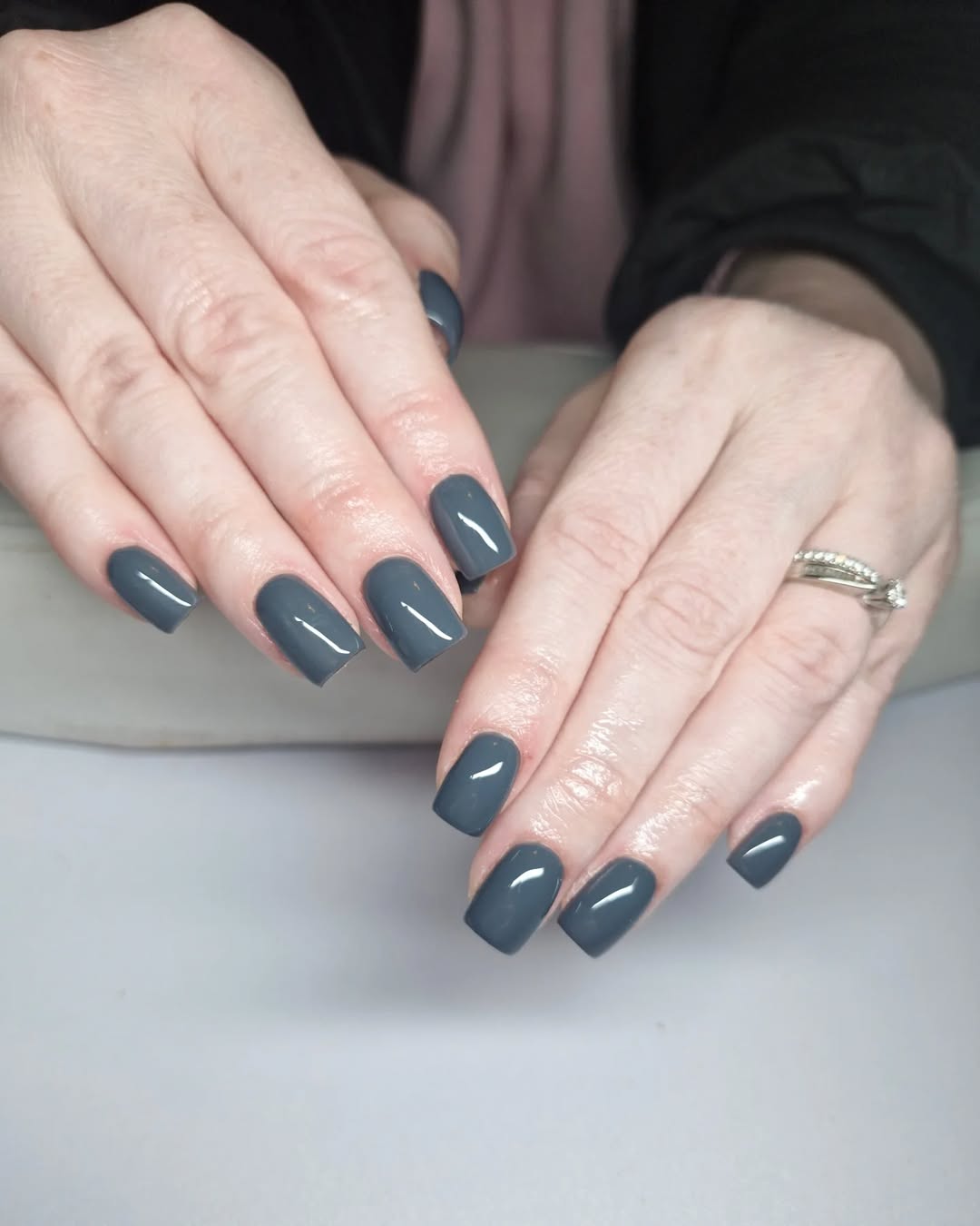 Stylish grey nails with a glossy finish