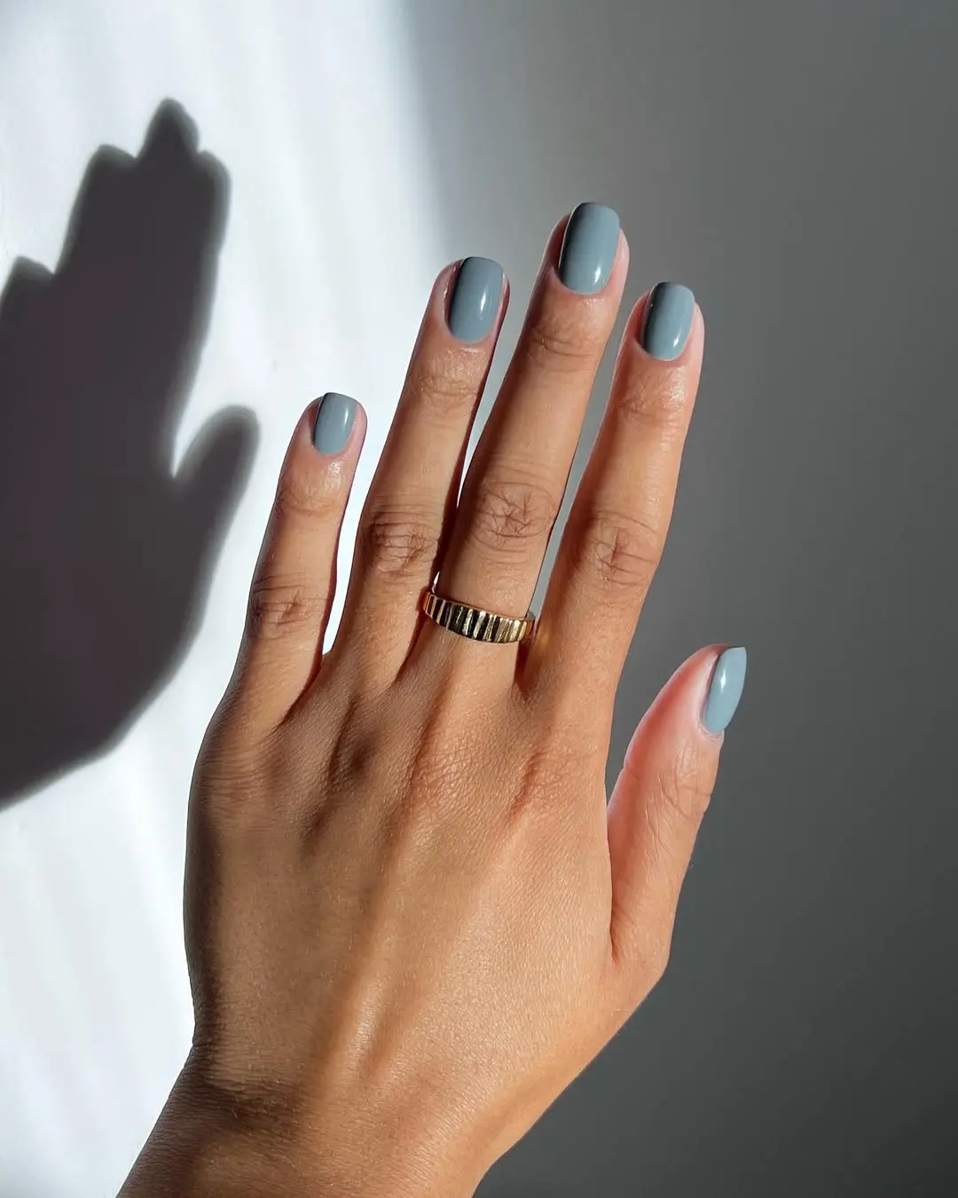 Sleek Grey Nails with a Modern Touch