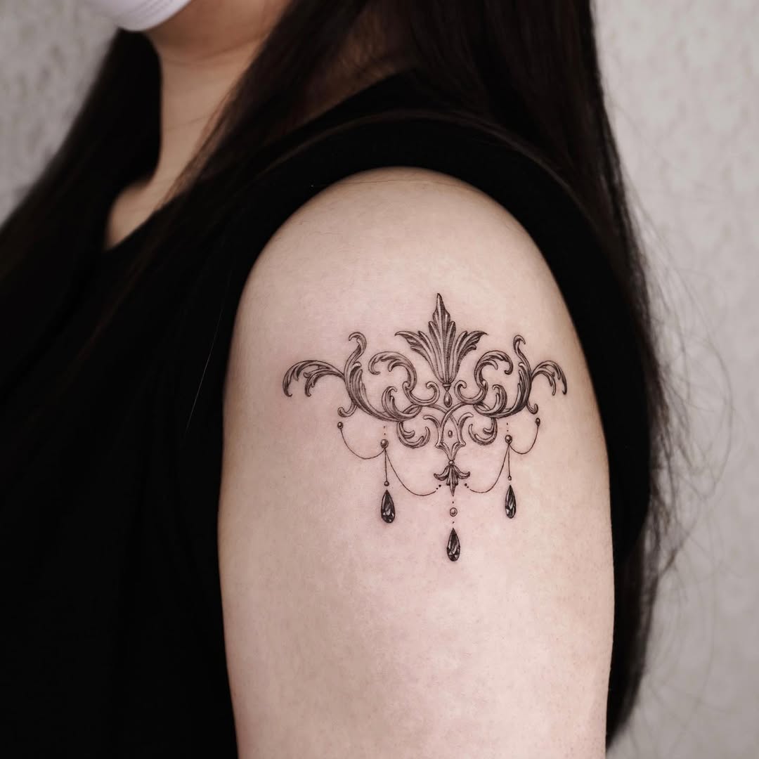 Delicate ornate design with hanging drops