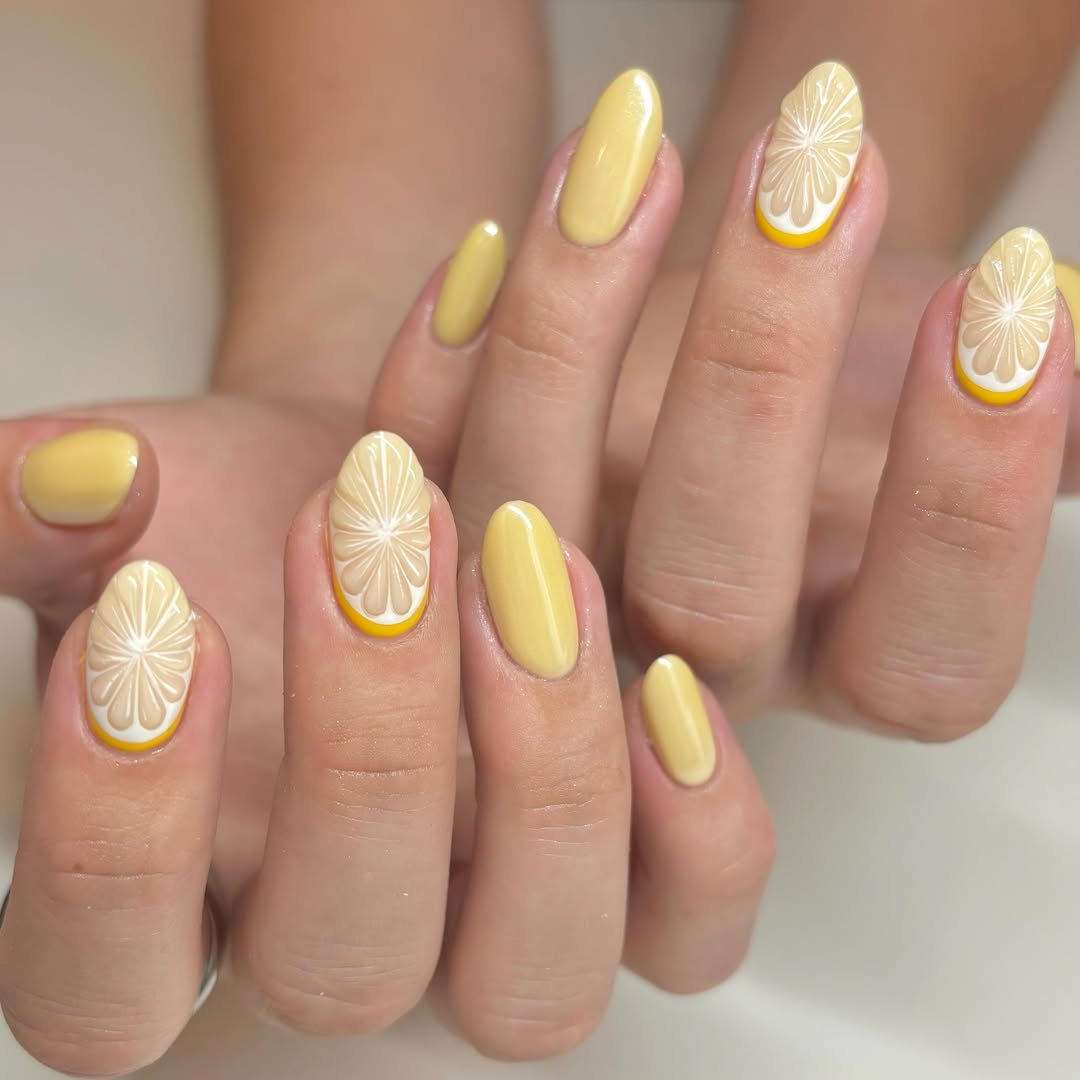 Chic yellow nails with playful floral designs