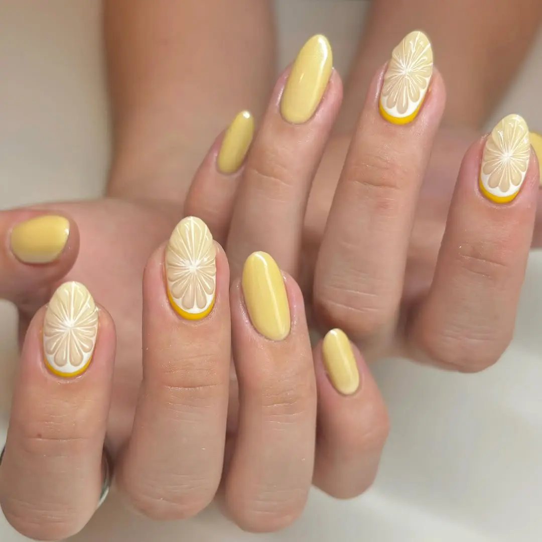 Chic yellow nails with playful floral designs