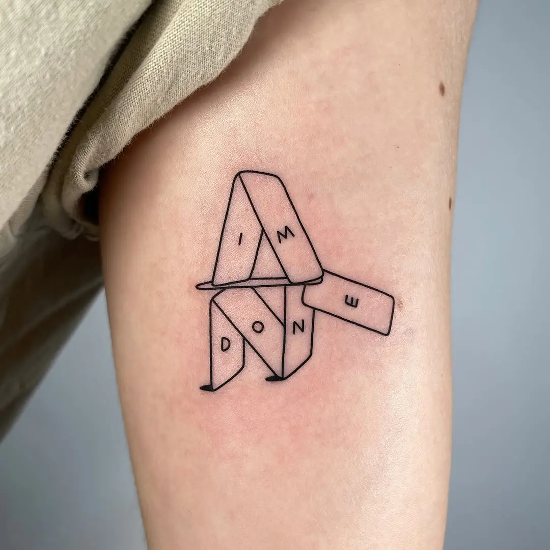 Minimalistic fine line tattoo with bold message