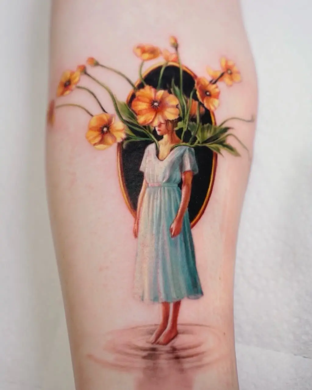 Intricate tattoo of a girl amidst flowers