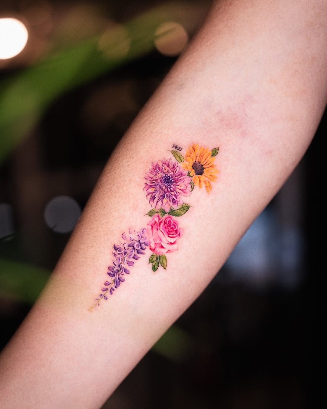 Vibrant Floral Tattoos on the Forearm